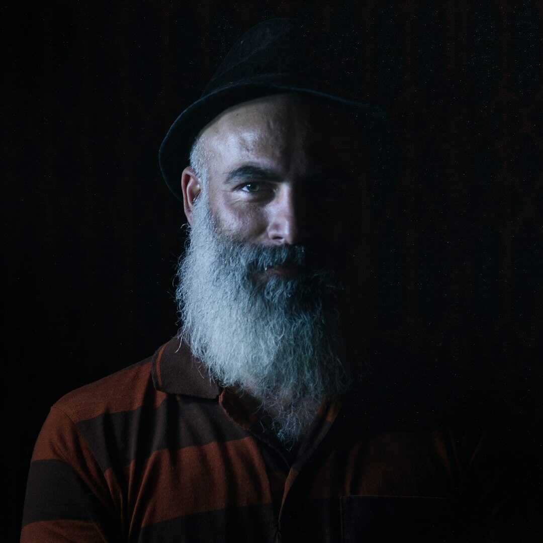 Studio portrait of an older Lithuanian man editor